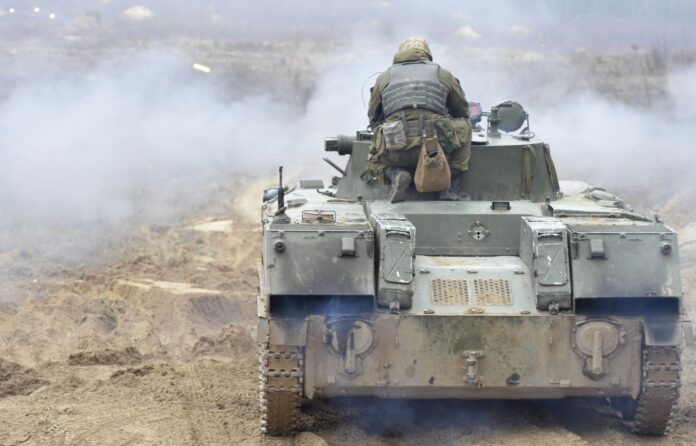 Ukranian soldier on a tank during a live-fire exercise during a 2016 joint training with U.S. Army troops. (U.S. Army photo)