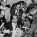 Sen. Joseph McCarthy speaks to reporters.