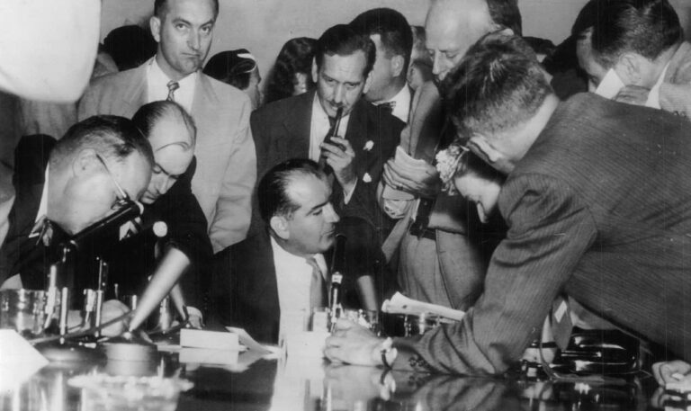 Sen. Joseph McCarthy speaks to reporters.